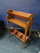 AN EDWARDIAN MAHOGANY BOOK TROUGH, having inlaid satinwood detail to each end, H 76 cm, W 55 cm