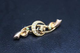 A CHESTER HALLMARKED 15 CARAT SEED PEARL AND PERIDOT BROOCH, approx weight 2.7g, W 4.25 cm