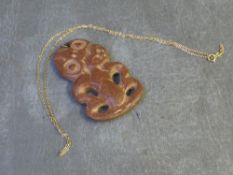 A MAORI TIKI PENDANT, 9 cm