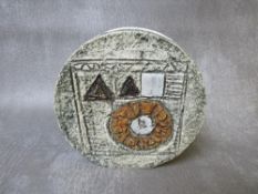 A TROIKA CIRCULAR POTTERY VASE, with oval opening to the top, signed to the base, H 11.5 cm