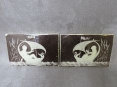 HENRY SAUNDERS - A PAIR OF RECTANGULAR PATE-SUR-PATE PLAQUES, decorated in a white slip with cherubs