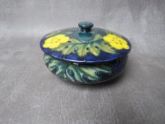 A MOORCROFT BUTTERCUP POWDER BOWL AND COVER, impressed marks to the base, Dia. 12.5 cm