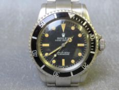 ROLEX - A GENTLEMANS STAINLESS STEEL OYSTER PERPETUAL SUBMARINER WRISTWATCH - REF 5513, black