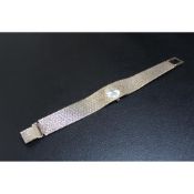 A HALLMARKED 9 CARAT GOLD ROTARY WRIST WATCH, approx weight 44.3g, W 2 cm