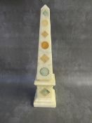 A GRAND TOUR STYLE PIETRA DURA OBELISK, H 37 cm, base W 9 x 9 cm