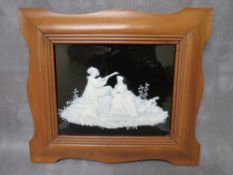 LAWRENCE BIRKS FOR MINTON - A PATE-SUR-PATE PLAQUE, decorated in a white slip with two classical