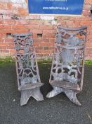 TWO HEAVILY CARVED AFRICAN TRIBAL CHAIRS