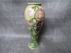 A MOORCROFT SWEET PEA SLENDER BALUSTER VASE, printed and impressed marks to the base, H 27 cm