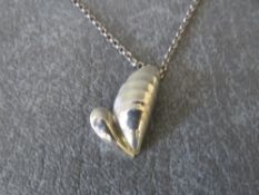 GEORG JENSEN - A HALLMARKED SILVER HEART SHAPED PENDANT NECKLACE, with makers mark