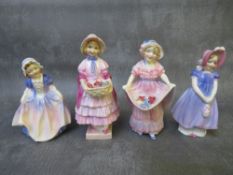 A ROYAL DOULTON 'GRETA' FIGURINE HN1485, 'Dinky Do' figure HN167, 'Lucy Ann' figure HN1502 and 'Ivy'