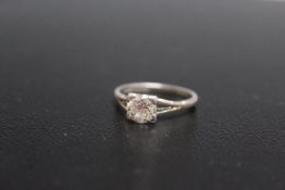 A DIAMOND SOLITAIRE RING, being of an estimated 1 carat, good colour and clarity, needs to be