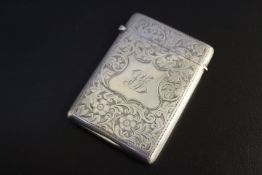 A HALLMARKED SILVER DECORATIVE CARD CASE - BIRMINGHAM 1912, 9 x 6.5 cm