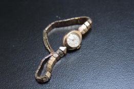 A HALLMARKED 9 CARAT GOLD HAMILTON WRIST WATCH, approx weight 16.3g, W 1.5 cm