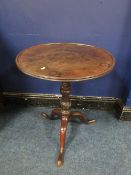 A 19TH CENTURY TILT-TOP PEDESTAL TABLE, the one piece tray top with original snap-lock mechanism,