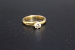A HALLMARKED 18 CARAT GOLD DIAMOND SOLITAIRE RING, half carat, approx weight 5.1g, ring size O 1/2