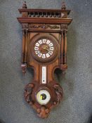 A LATE 19TH CENTURY FRENCH WALL CLOCK WITH BAROMETER AND SPIRIT THERMOMETER, in an elaborately
