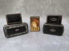 A COLLECTION OF FIVE VINTAGE PAPIER MACHE SNUFF BOXES, to include one with a portrait image to the
