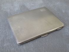 A HALLMARKED SILVER CIGARETTE CASE, makers mark for J.G.Ltd Birmingham, approx weight 141 g