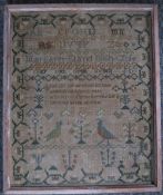 A FRAMED AND GLAZED 19TH CENTURY SAMPLER