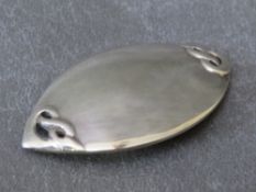 A LIBERTY HALLMARKED SILVER BROOCH, oval form with Celtic style decoration to each end, approx. W