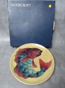A MOORCROFT 'CARP' PATTERN LIMITED EDITION CIRCULAR CHARGER, decorated by Sally Tuffin and dated