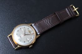 A VINTAGE WRISTWATCH 'RECORD' GENEVA, with day and date 'Datofix' and moonphase, Dia. 2.5 cm