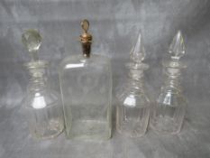 A 19TH CENTURY ETCHED GLASS RECTANGULAR SPIRIT FLASK, dated 1851, H 28.5 cm, together with three