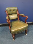 A JOHNSTONE AND JEANES MAHOGNAY UPHOLSTERED ARMCHAIR, the back having a reclining and revolving