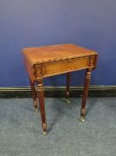 A WILLIAM IV MAHOGANY DROPLEAF TABLE OF SMALL PROPORTIONS, with single frieze drawer, raised on
