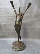 A BRONZE ART NOUVEAU FIGURAL TABLE LAMP BY FIRMIN BATE, the arms outstretched holding cornucopia