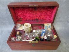 A 19TH CENTURY APOTHECARY BOX, with brass handle, containing various bottles etc., H 15 cm, W 30 cm,
