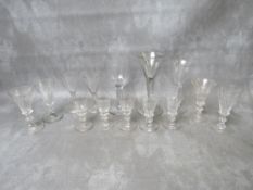 A COLLECTION OF FOURTEEN ASSORTED GEORGIAN GLASSES, to include plain stem examples (14)