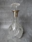 A SILVER MOUNTED CUT GLASS DECANTER, Walker & Hall, Sheffield, 1923, H 27 cm