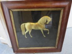 A 19TH CENTURY STUDY OF A HORSE IN RELIEF, in yellow metal, framed and glazed, 38 x 38 cm