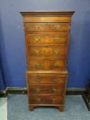 A SMALL 20TH CENTURY WALNUT CROSSBANDED CHEST ON CHEST OF SMALL PROPORTIONS, with brushing slide,