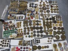 A COLLECTION OF MAINLY METAL EXAMPLES OF VINTAGE BUTTONS, varying styles and periods, to include a