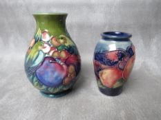 A MOORCROFT 'FINCHES' PATTERN BALUSTER VASE, impressed marks to base, H 12.5 cm, together with a