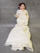 A 19TH CENTURY PORCELAIN BODIED DOLL 'BABY EDNA', inscribed S.P.B.J. 236 Paris