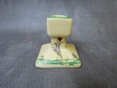 A MID 20TH CENTURY SUSIE COOPER 'PUCK' SQUAT LOW CANDLESTICK, printed marks to the base, H 7 cm