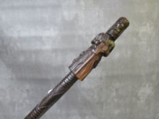 A VINTAGE CARVED WOODEN WALKING STICK, with religious figure as handle, L 87 cm