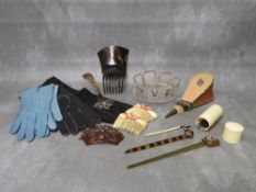 A COLLECTION OF VINTAGE HAIR ACCESSORIES, to include various combs and an aurora borealis rhinestone