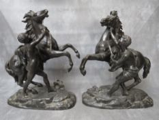 A PAIR OF FINELY CAST BRONZE MARLY HORSES WITH TRAINER, H 34 cm
