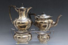 A HEAVY HALLMARKED SILVER FOUR PIECE TEA SERVICE BY JAMES DEAKIN & SONS - SHEFFILED 1918, retailed
