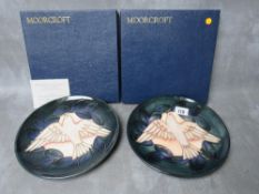 A PAIR OF MOORCROFT 'DOVE' CIRCULAR PLATES, limited edition No. 381 & 481 / 500, impressed marks,