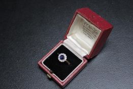 A CABACHON SHAPPHIRE AND DIAMOND RING, set in yellow metal indistictly stamped 18, approx weight 2.