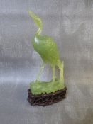 A CHINESE JADE STORK ON WOODEN BASE, H 16.5 cm, include base H 20 cm