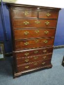 A 19TH CENTURY MAHOGANY CHEST ON CHEST, the upper section with an arrangement of two short above