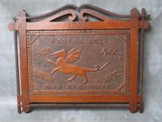A 19TH CENTURY WELSH OAK FOLK ART PANEL DEPICITNG A DRAGON, with decorative surround, overall 47 x