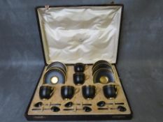 A ROYAL WORCESTER CASED SET OF SIX COFFEE CANS AND SAUCERS, with a set of six .925 hallmarked silver
