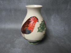 A MOORCROFT CHRISTMAS ROBIN BALUSTER VASE, impressed marks to the base, H 13.5 cm